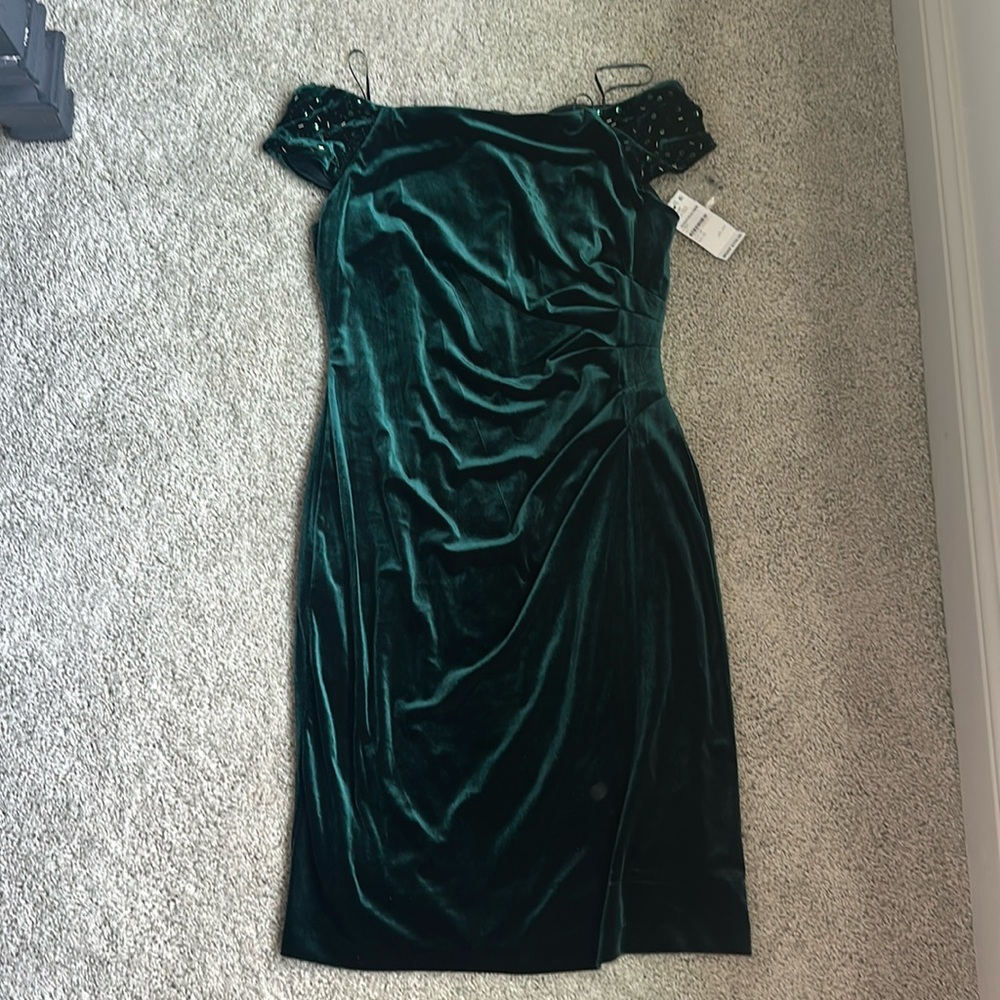 Emerald green dress embellishment in sleeve. Size 10p